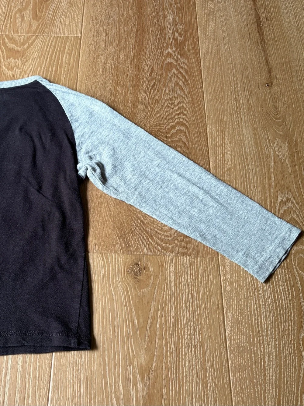 The Children’s Place Football Black Tee with Gray Neckline and Sleeves, size 5/6